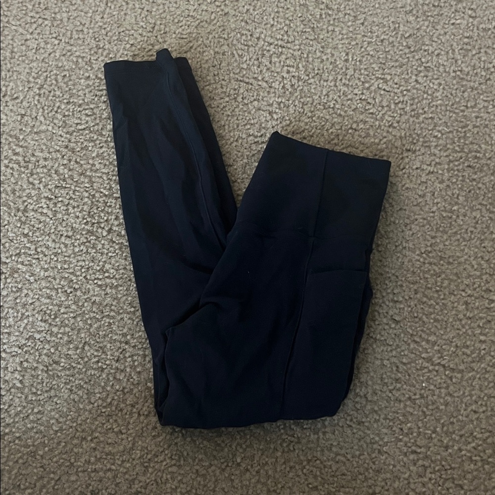 Athleta Salutation Stash Pocket II 7/8 Tight